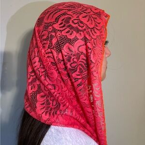 Bright pink mantilla or church veil